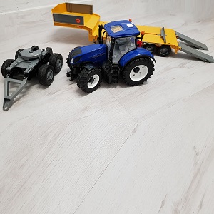 
Bruder combination of New Holland tractor, dolly and low loader (offer)