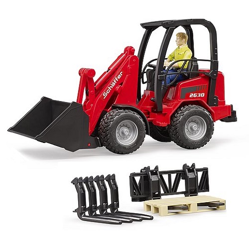 Bruder Schaffer compact loader 2034 with toy figure and accessories